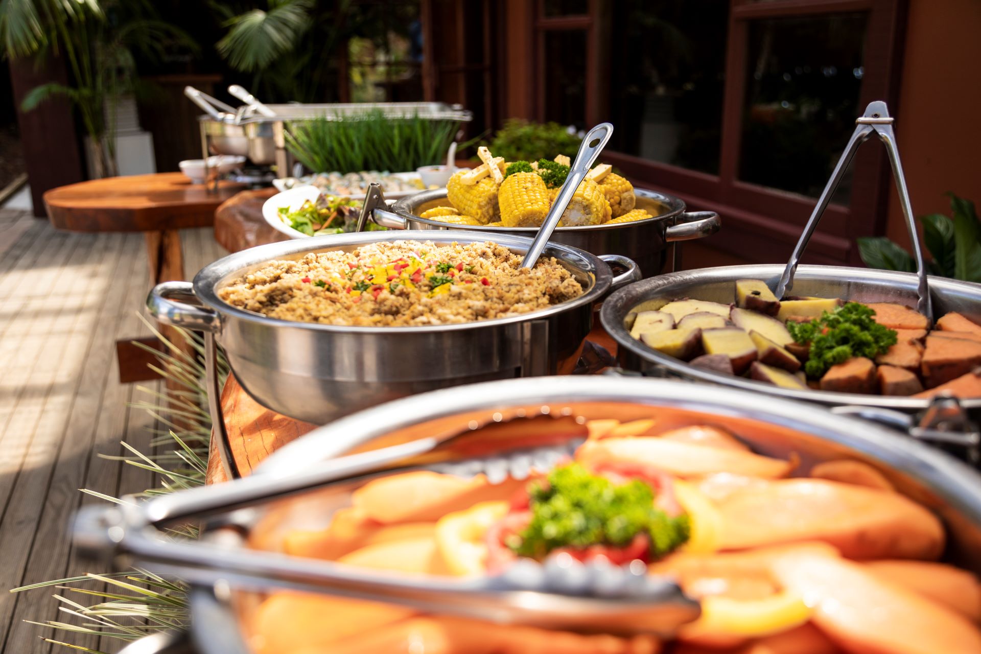 picture of multiple dishes of food on a table at conference